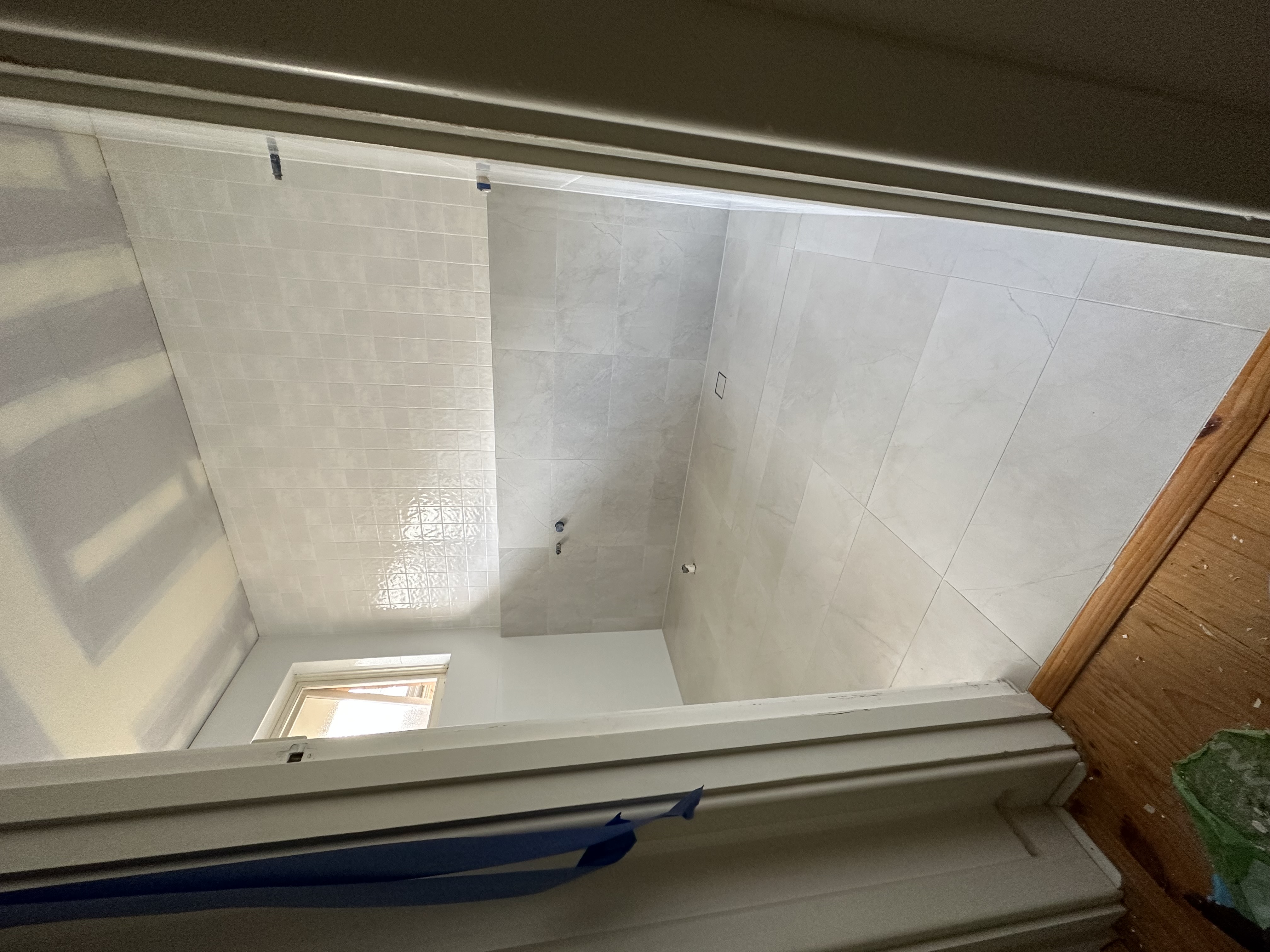 Detailed tile work with precision cutting and fitting